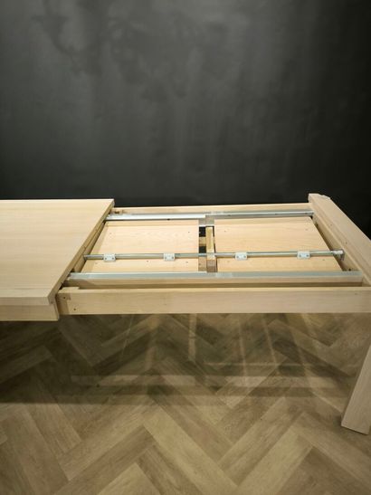 Large rectangular dining table with two extensions....