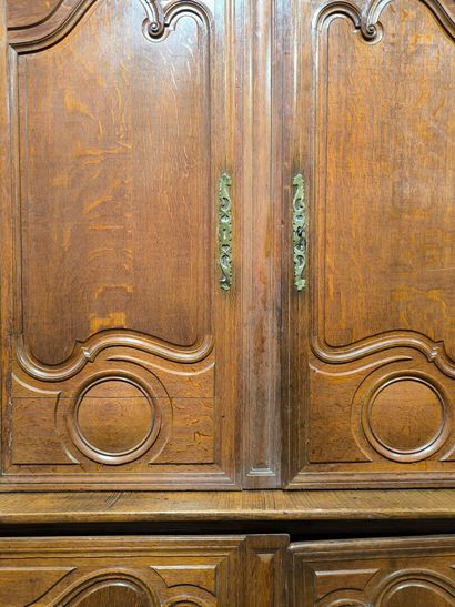 Two-body buffet in carved and molded oak....