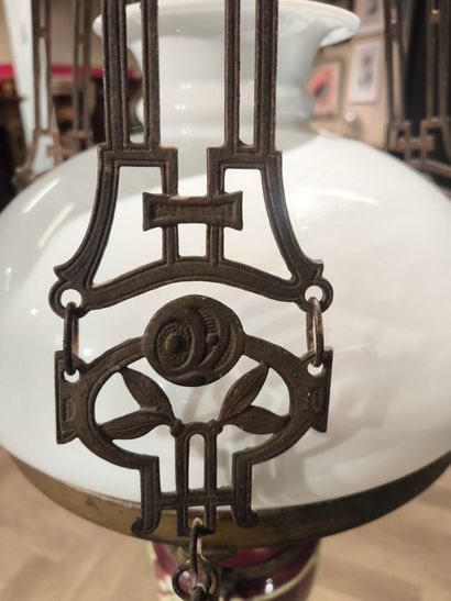 Curious metal suspension decorated with skiers,...