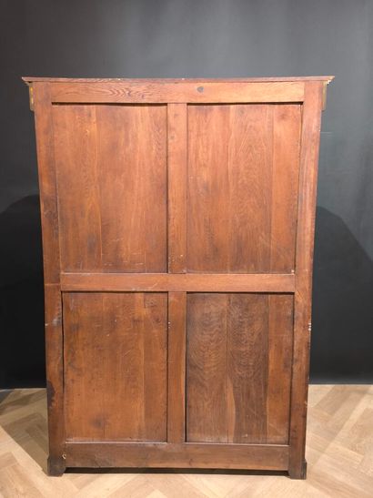 . Veneered display case with two glass doors,...