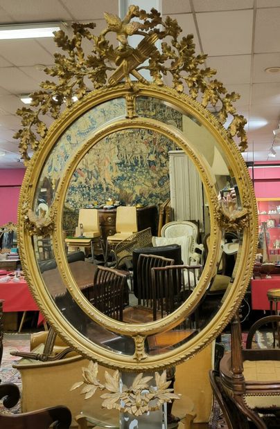 Large oval mirror with glazing beads and...