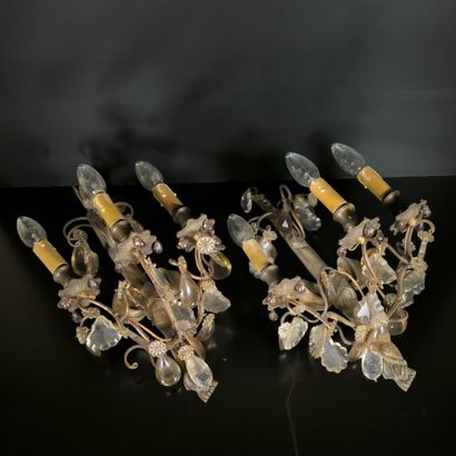 Pair of three-light bronze sconces in the...