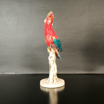 Bird in polychrome porcelain. Signed. Height:...