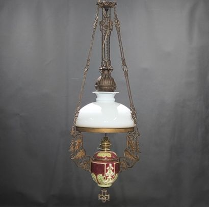 Curious metal suspension decorated with skiers,...