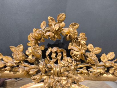 Wood and gilded stucco glazed mirror, decorated...