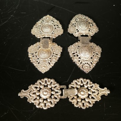 Set of three silver cape buckles or coat...