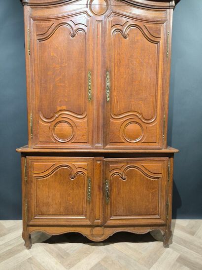 Two-body buffet in carved and molded oak....