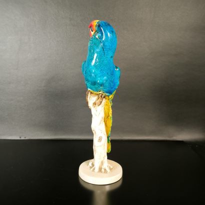 Polychrome porcelain parrot. Signed. Height:...