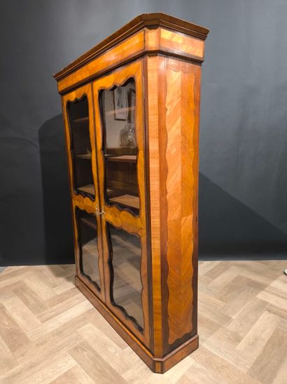 . Veneered display case with two glass doors,...