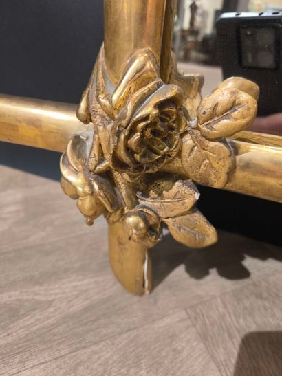 Wood and gilded stucco glazed mirror, decorated...