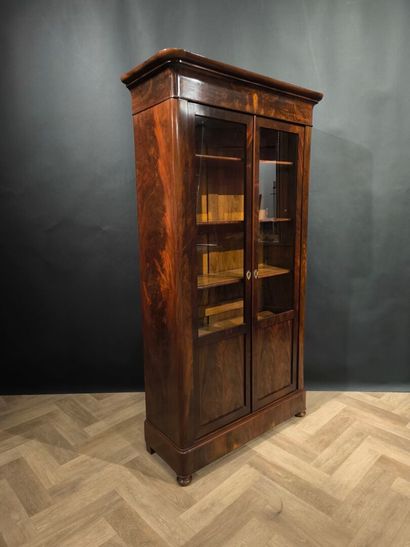 Mahogany and mahogany veneer bookcase, opening...