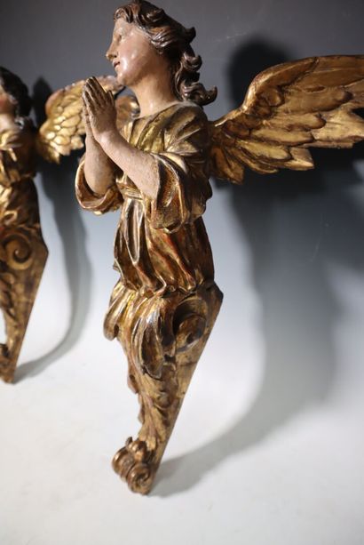 Pair of gilded wood sconce brackets depicting...