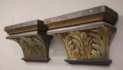 Pair of wall brackets in painted wood carved...