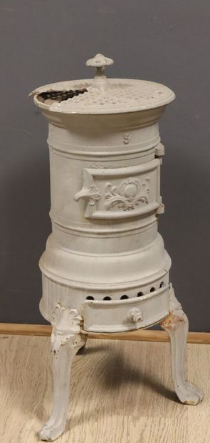 Grey-painted cast-iron wood-burning stove...
