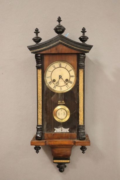 Wall clock in wood and blackened wood, dial...