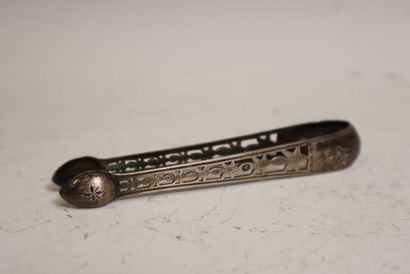 Two silver sugar tongs, one openwork with...