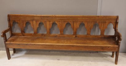 Natural wood bench, the back decorated with...