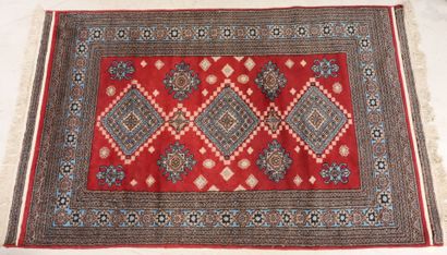 Oriental rug
in blue and red hand-knotted...