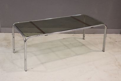 Coffee table with glass top mounted on a...
