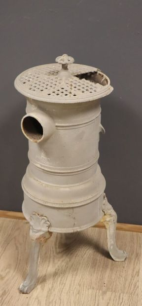 Grey-painted cast-iron wood-burning stove...