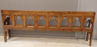 Natural wood bench, the back decorated with...