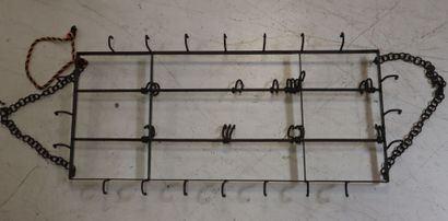 Butcher's fang, in black lacquered metal,...