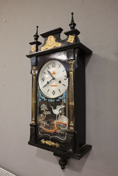 Wall clock in blackened wood (with key)....