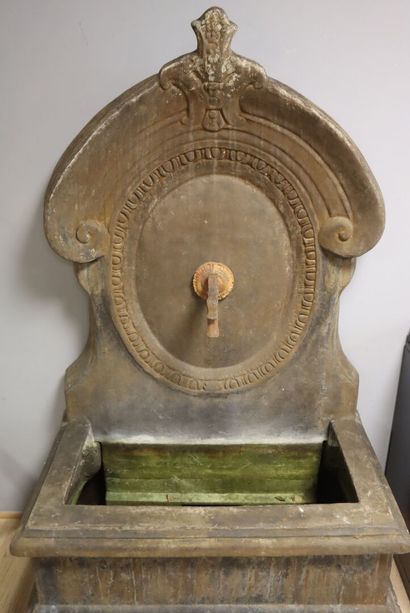 Fountain in patinated sheet metal: a widely...