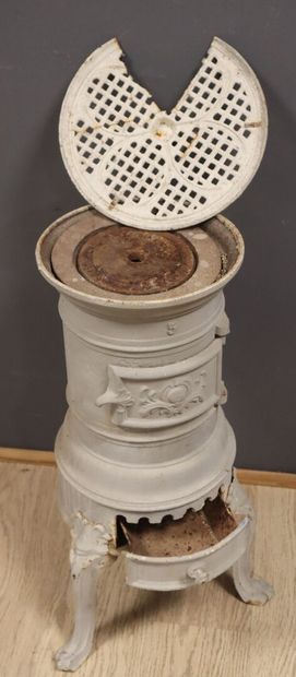 Grey-painted cast-iron wood-burning stove...