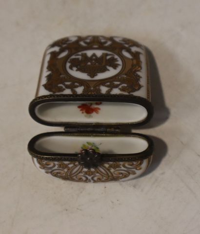 A white porcelain snuff box monogrammed M....