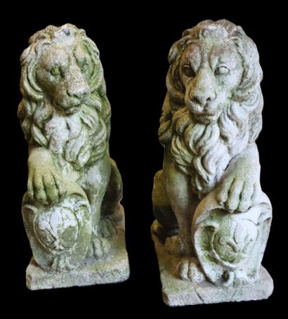 Pair of heraldic lions in reconstituted stone....