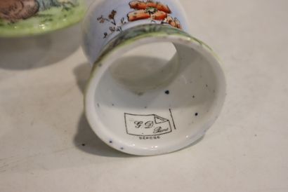 Earthenware egg service with historiated...