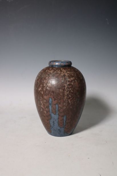 Brown and blue enameled stoneware vase with...