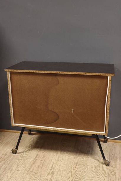 Wood and Formica bar cabinet in natural wood...