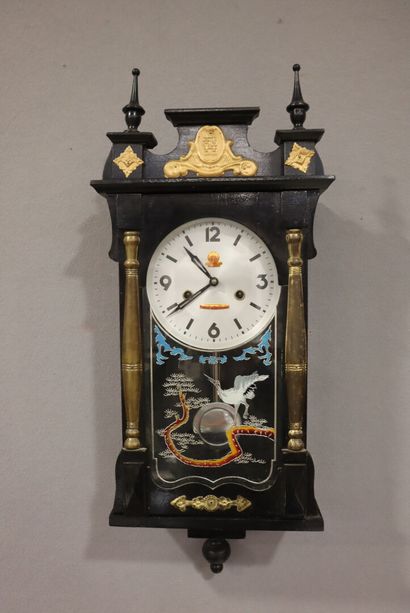 Wall clock in blackened wood (with key)....