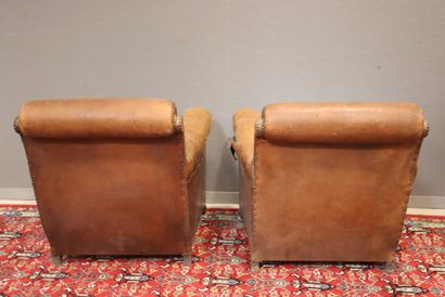 Pair of club armchairs upholstered in studded...