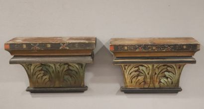 Pair of wall brackets in painted wood carved...