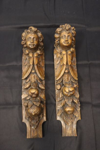 Carved walnut element, representing angels...
