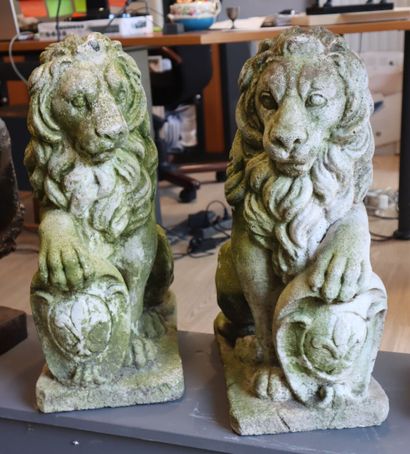 Pair of heraldic lions in reconstituted stone....