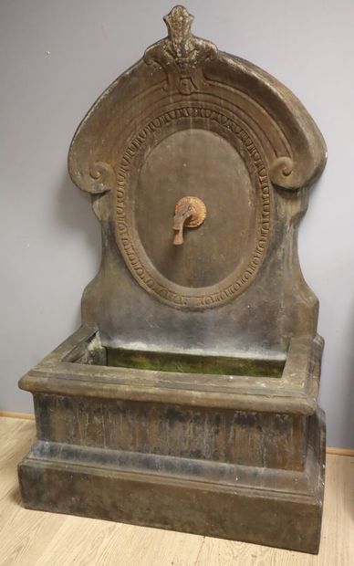 Fountain in patinated sheet metal: a widely...