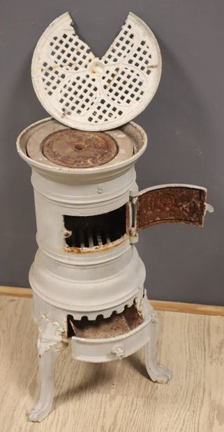 Grey-painted cast-iron wood-burning stove...