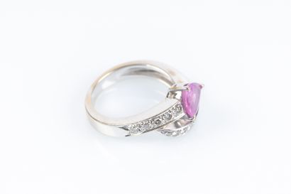 White gold ring set with a pear-shaped pink...