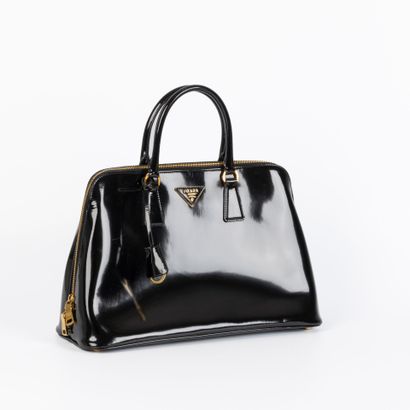 PRADA. Black patent leather handbag. 36 x...