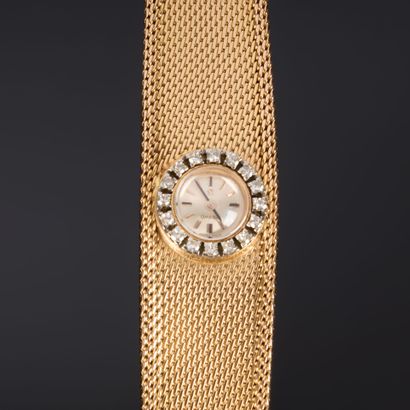 OMEGA. Gold ladies' wristwatch, diamond-set...