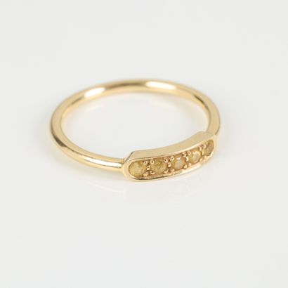 Gold ring set with 5 yellow stones (citrines?)....