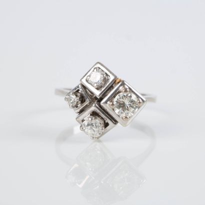 White gold ring (750‰) adorned with four...