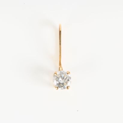 Gold pendant set with an oval aquamarine...