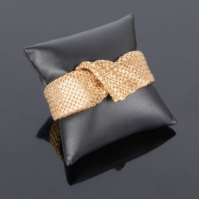 Large braided gold bracelet. Circa 1950-60....