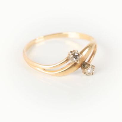 toi et moi ring in gold set with two small...