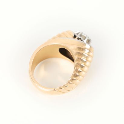Gold and platinum tons ring set with an old-cut...